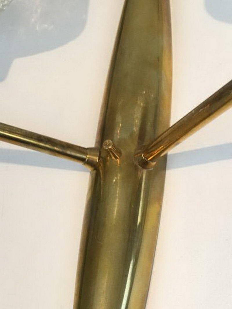 Pair of bronze sconces with worked glass reflectors