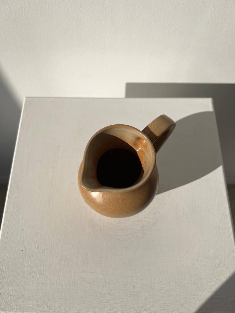 Pitcher in light beige sandstone