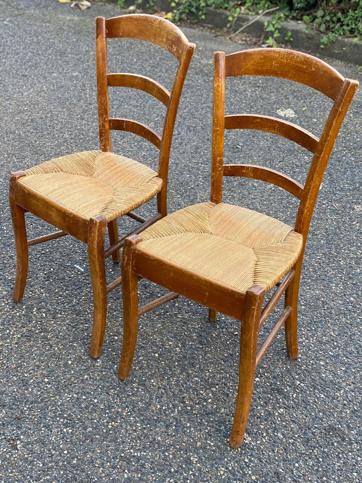 2 solid wood and straw dining chairs