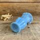 Small blue milk glass vase