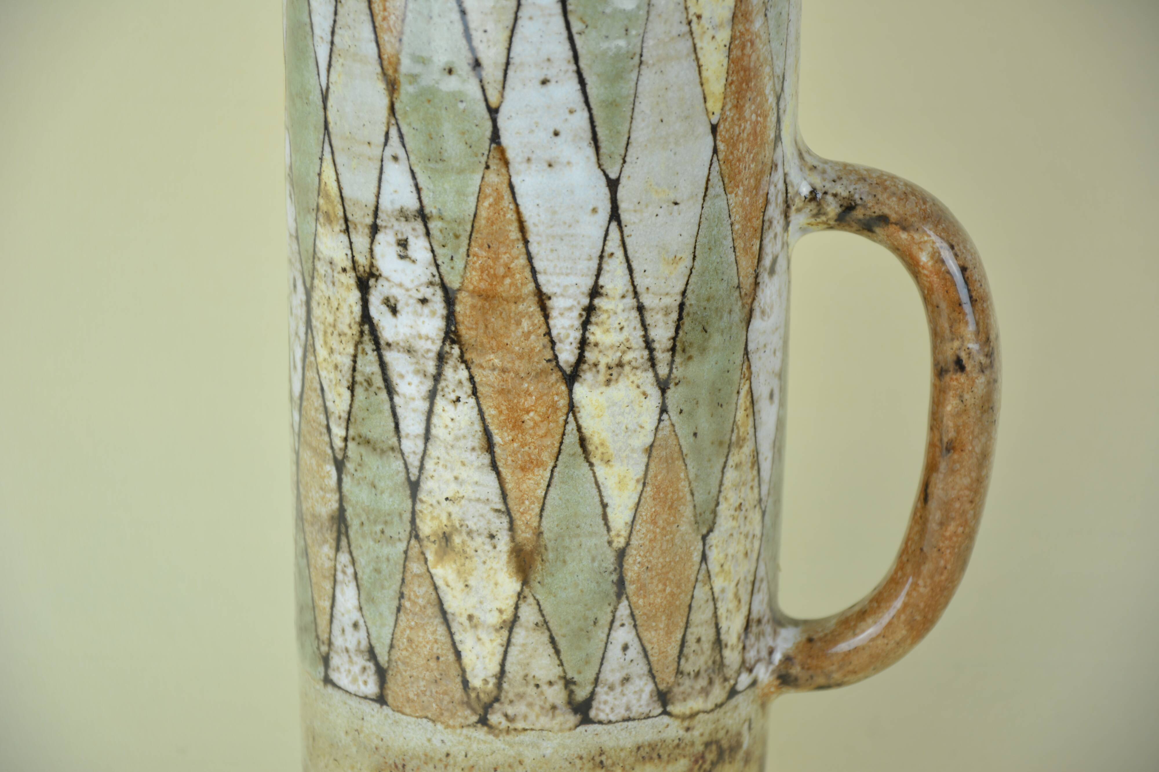 Pitcher and glasses with harlequin decoration, Atelier du Vieux Moulin