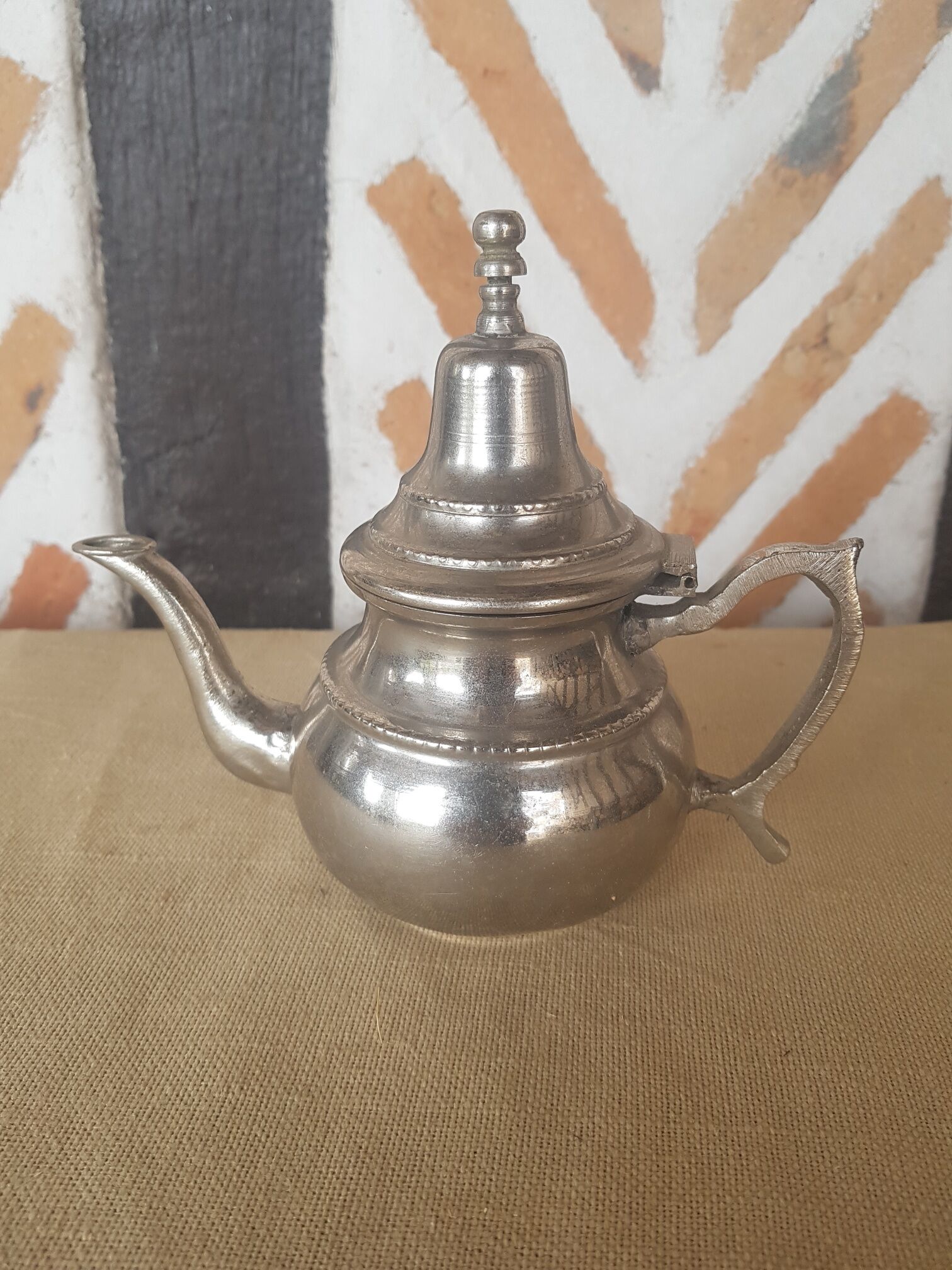 Oriental teapot silver metal