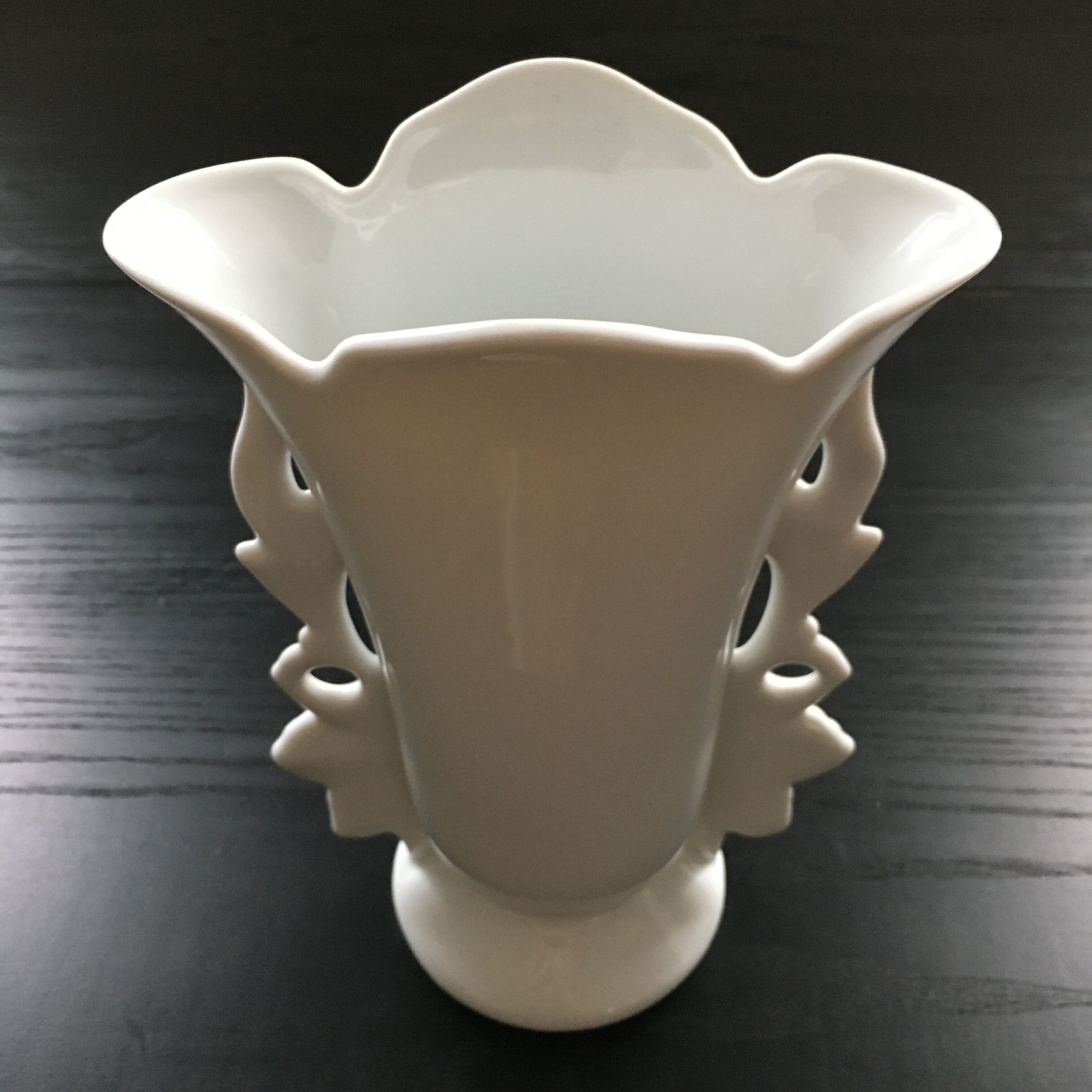 White vase flowery handles