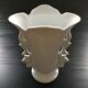 White vase flowery handles