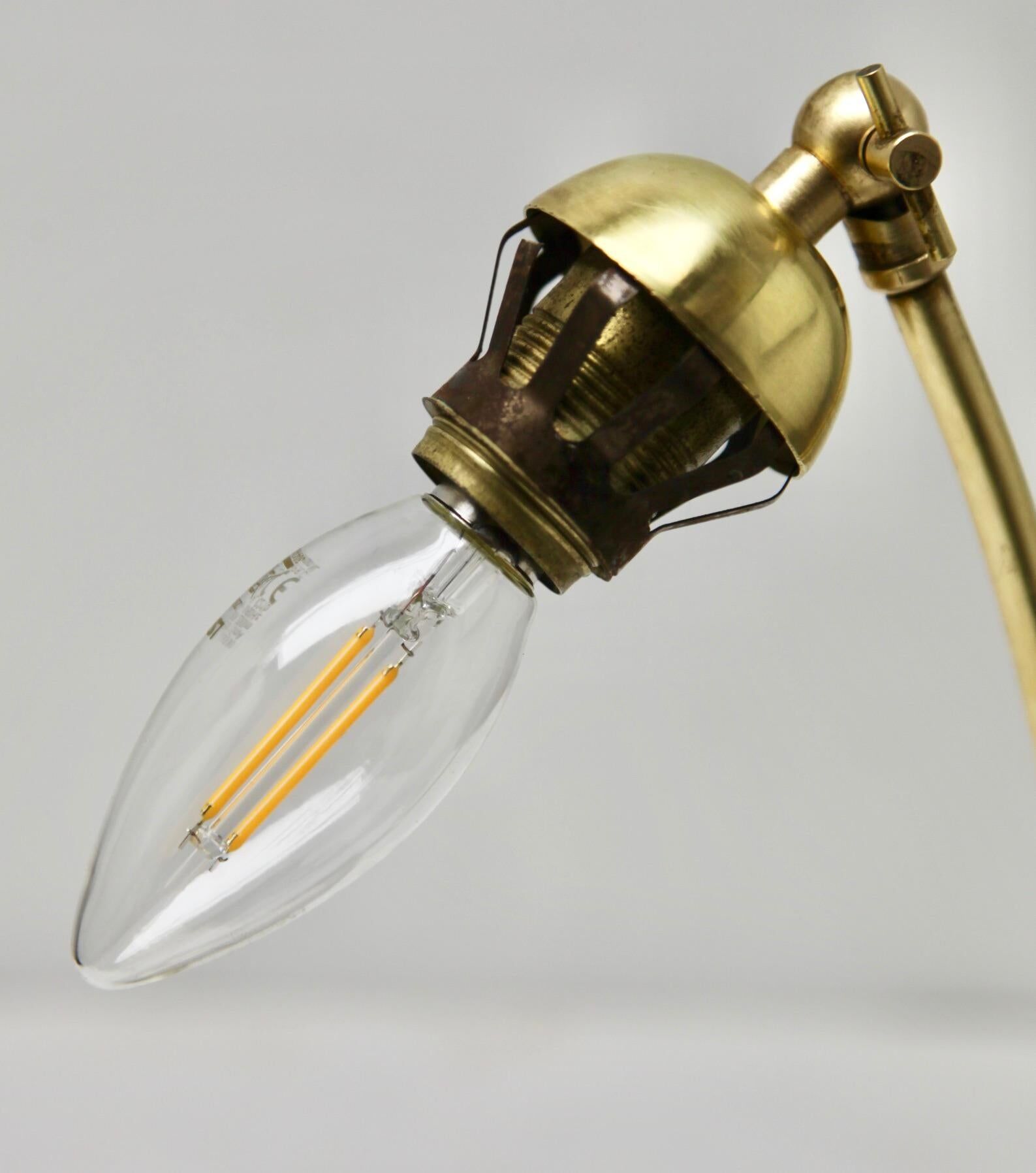 Vintage lamp with white glass lampshade and brass fitting