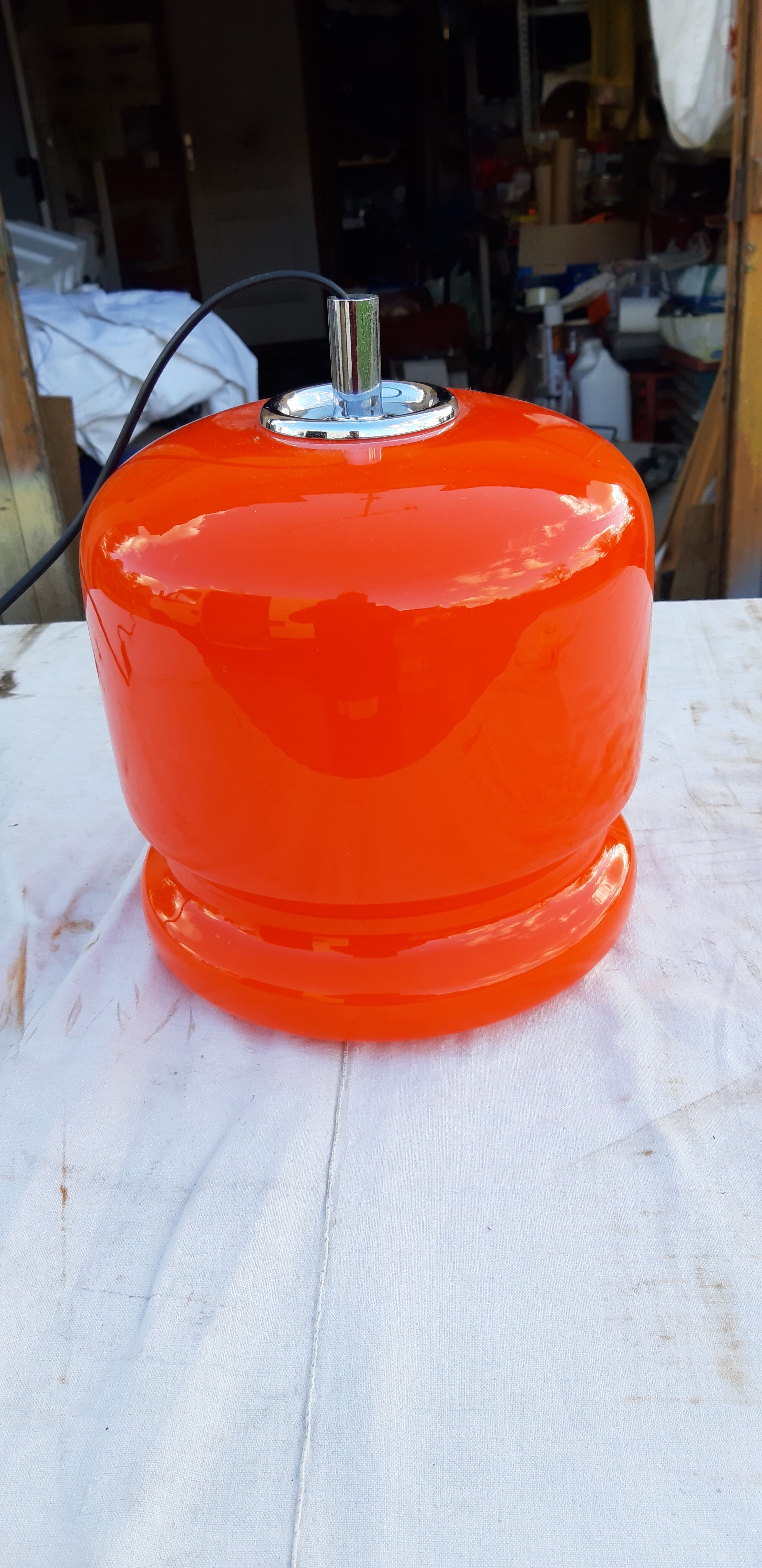 Vintage lamp of the 70s in orange opaline