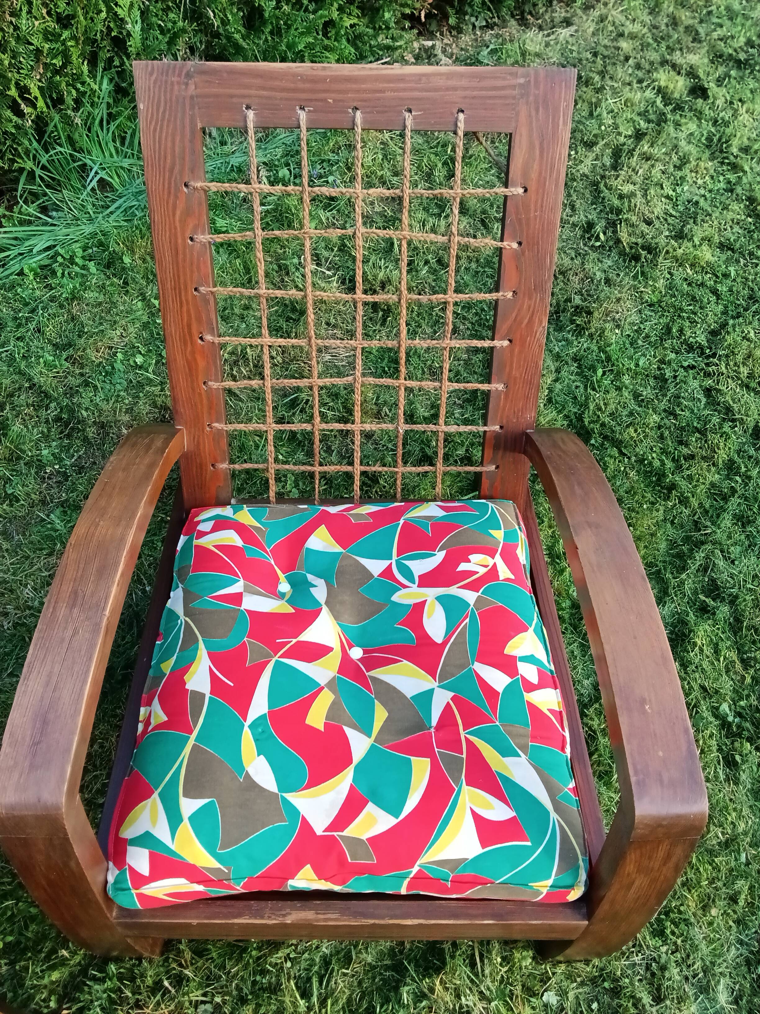 A pair of vintage rope and wood armchairs