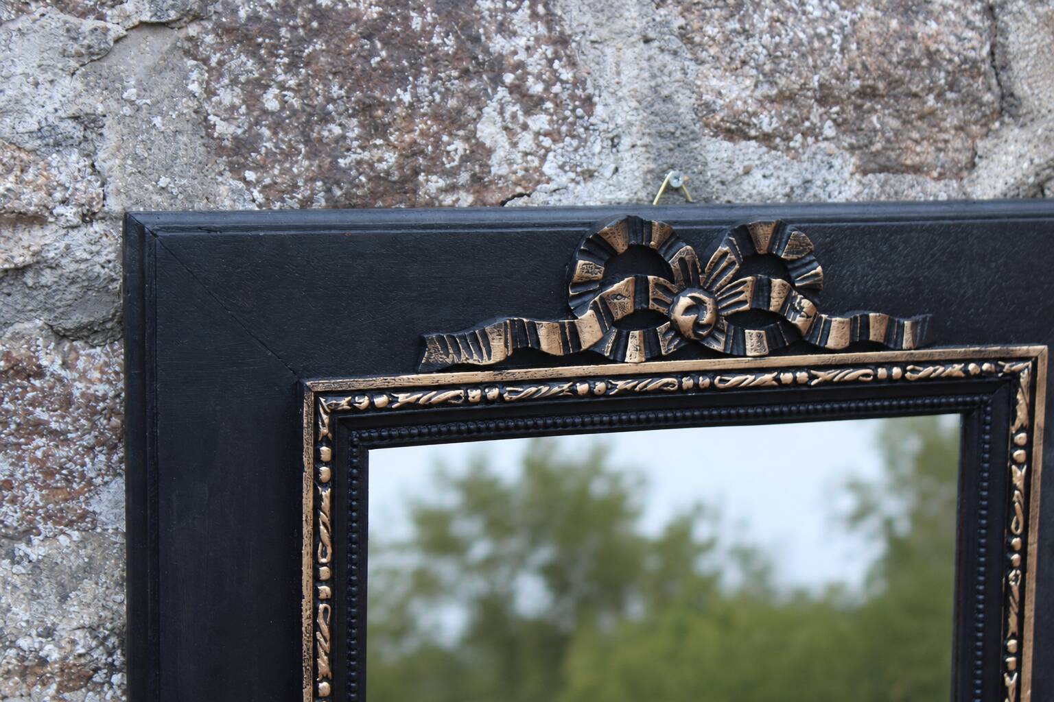 Vintage black and gold wooden mirror with a pediment – Napoléon III style