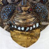 Vintage ritual mask in repoussé brass from Nepal/Tibet.