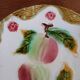 Assiette ancienne en barbotine