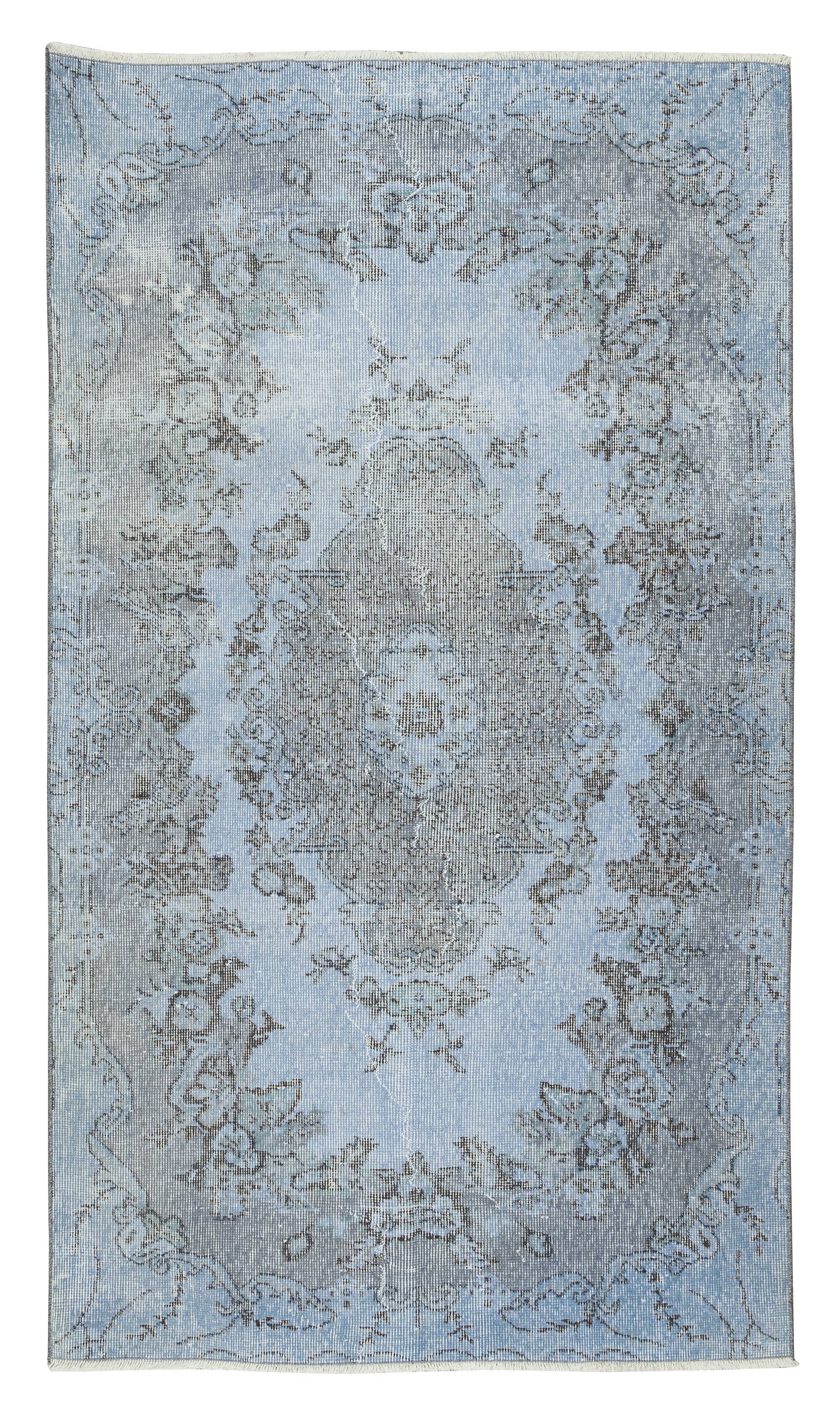 Mid-20th century hand-knotted turkish rug over-dyed in light blue. tek0394