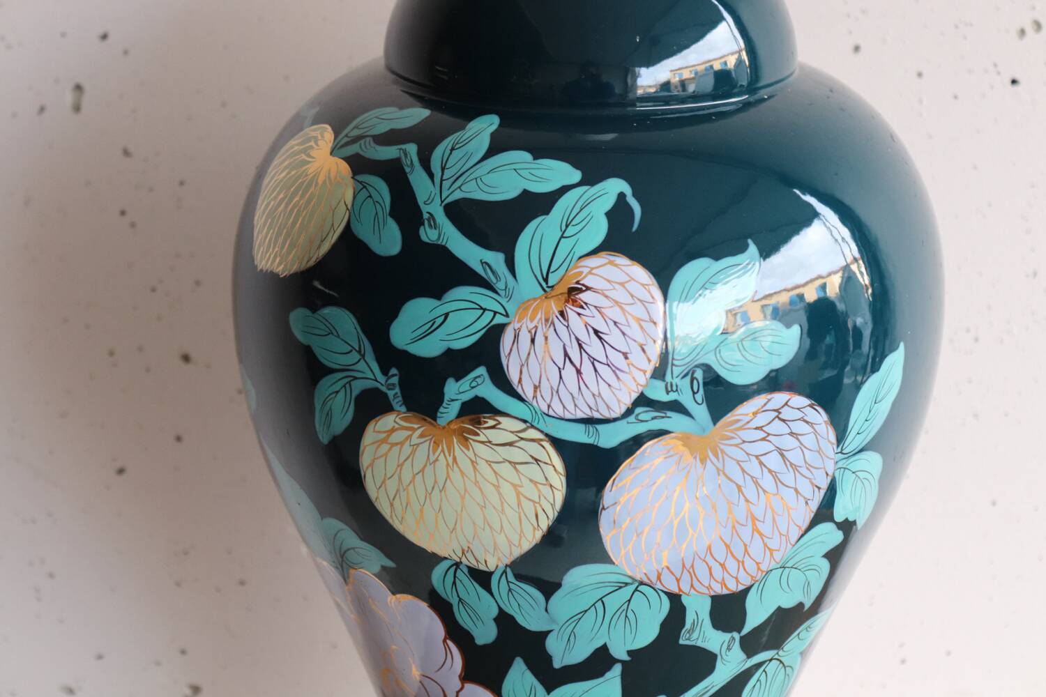 Vintage ceramic lamp with floral decoration.