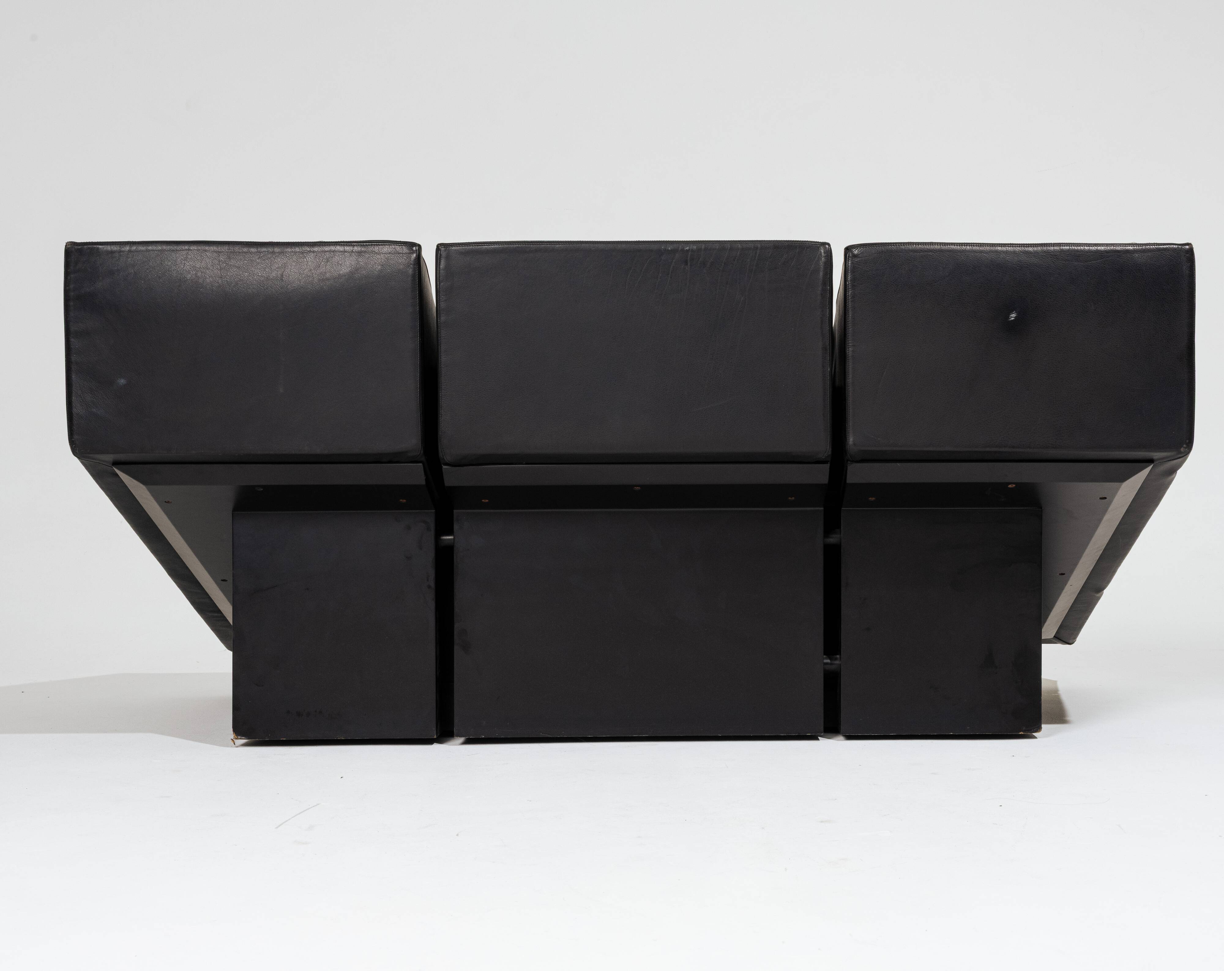 Obliqua two-seater leather sofa, Mario Botta, 1980s