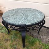 Low marble and black metal table