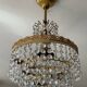 Chandelier with crystal and brass pendants