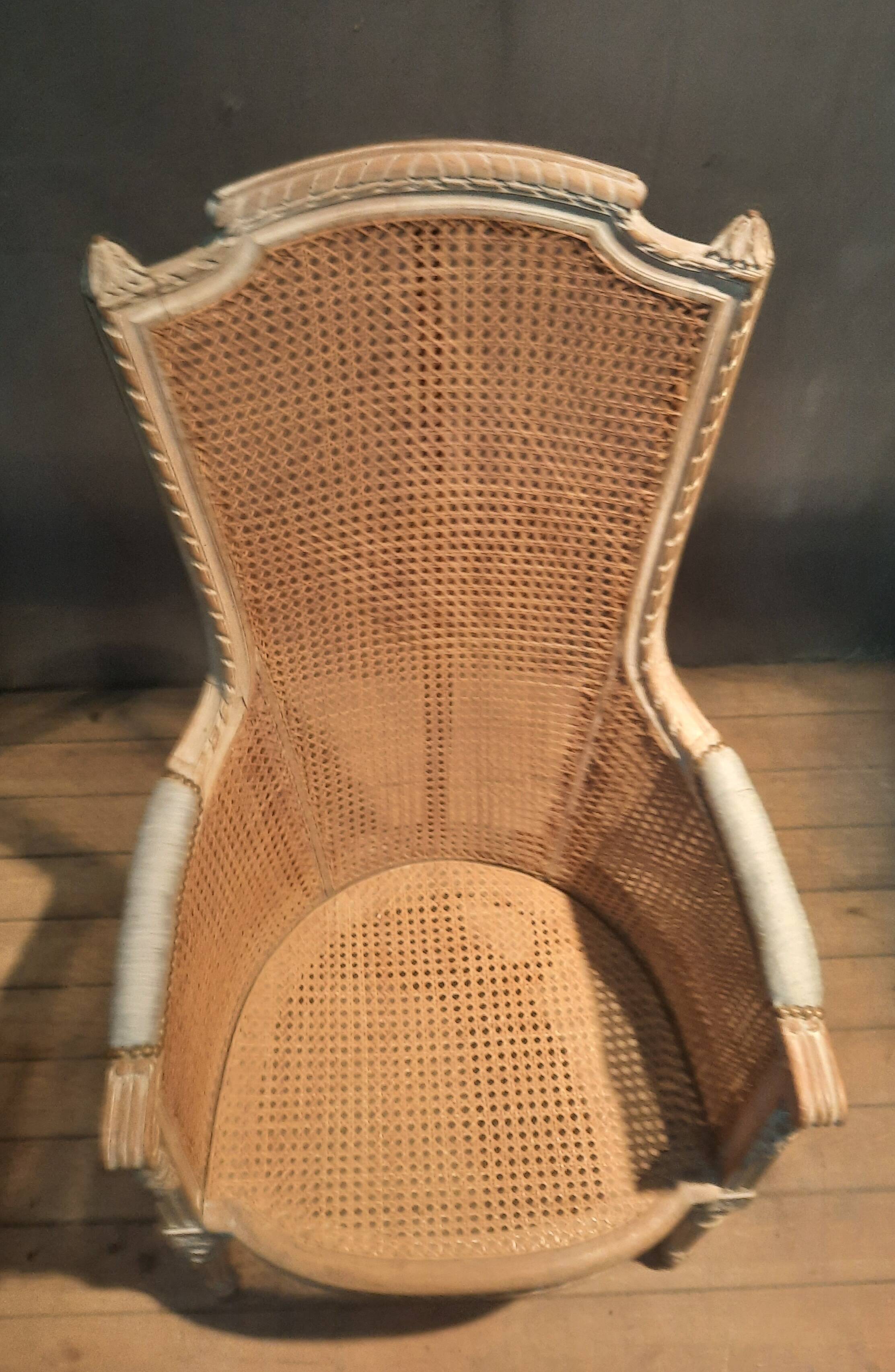 Louis XVI high-backed caned armchair