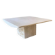 Square coffee table in honed travertine by Claude Berraldacci