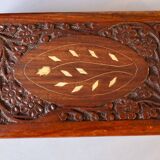 Antique hand-carved wooden boxes.