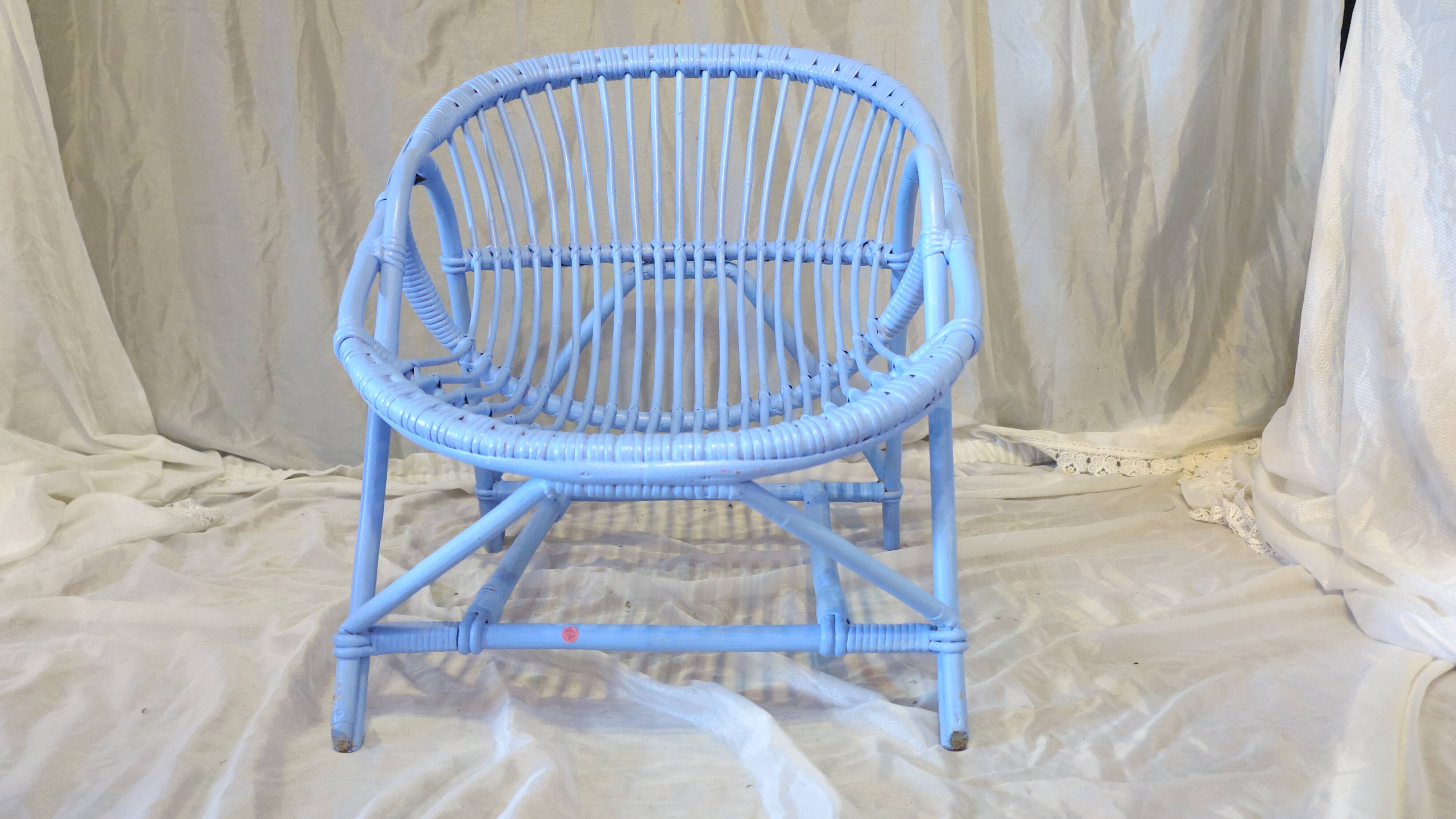 Blue painted rattan armchair