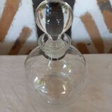Round carafe in chiseled glass