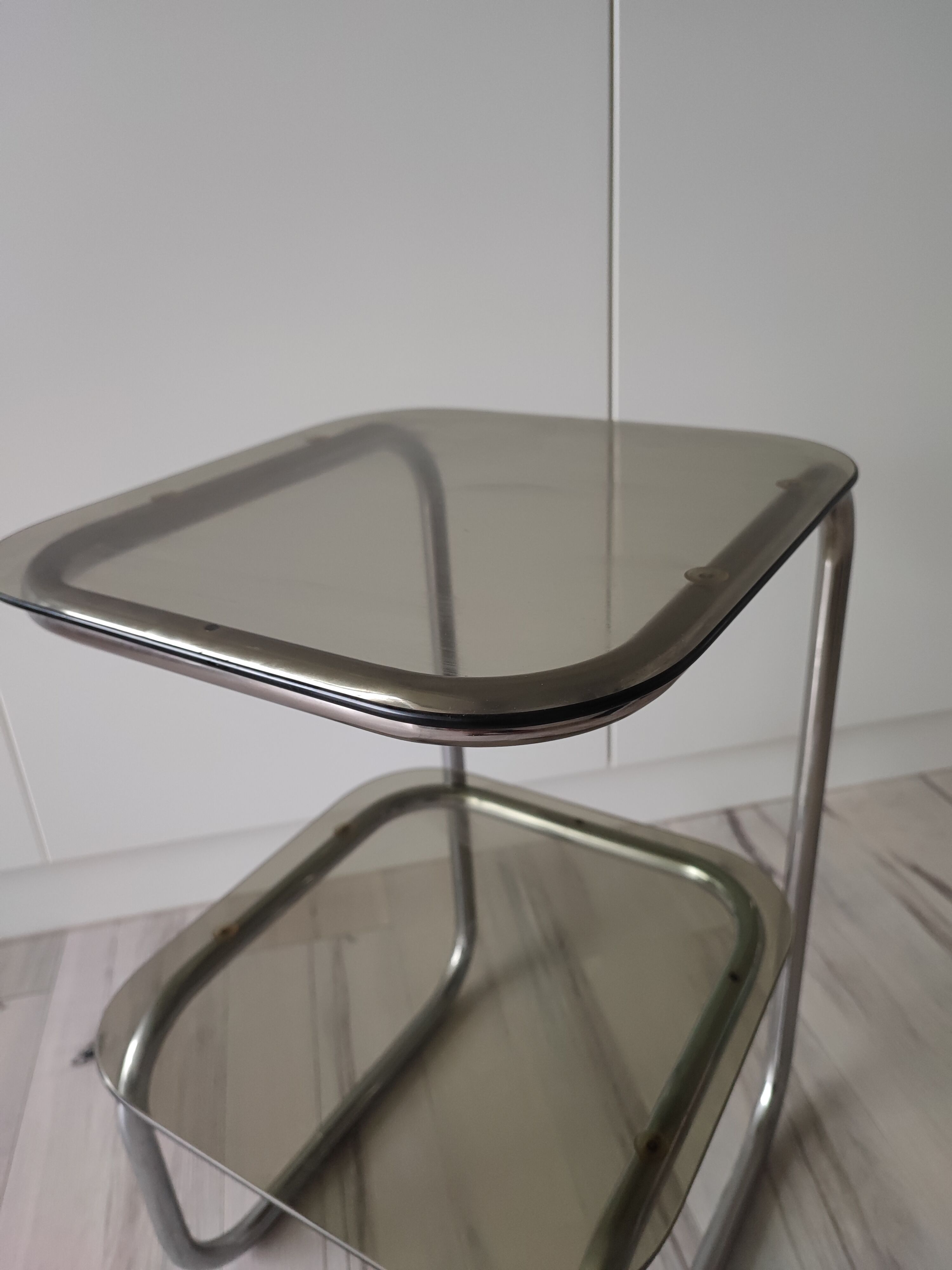 Side table or pedestal table in chrome and glass