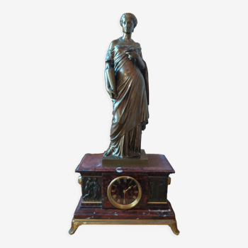 Pendulum with bronze statue