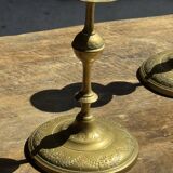 Pair of gilded candlesticks with engraved flower garland motifs H22