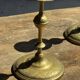 Pair of gilded candlesticks with engraved flower garland motifs H22