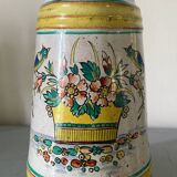 Old ceramic pitcher (18th century?) decorated with polychrome exotic birds