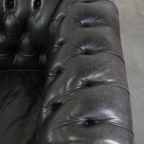 Black chesterfield 3-seater sofa made of cowhide leather in English style