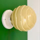 Applique globe vintage art déco en opaline jaune pâle