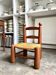 Low brutalist chair in dark wood and straw no. 3