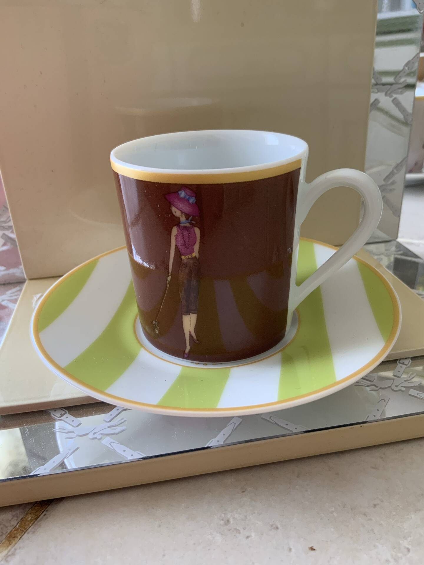 4 cups and saucers porcelain Menard de Noblat - shopping series