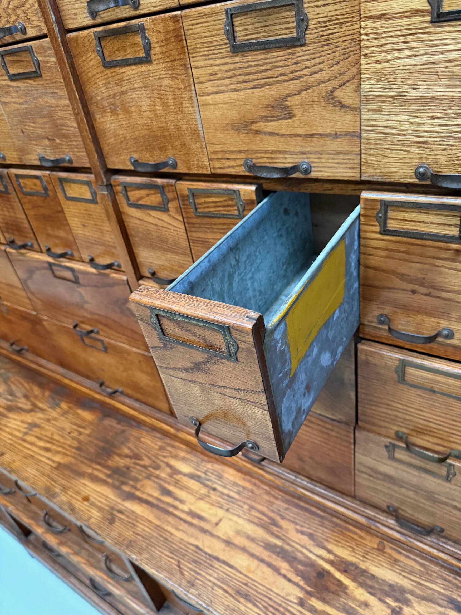 Antique very large American oak grain / apothecary cabinet, ca 1900