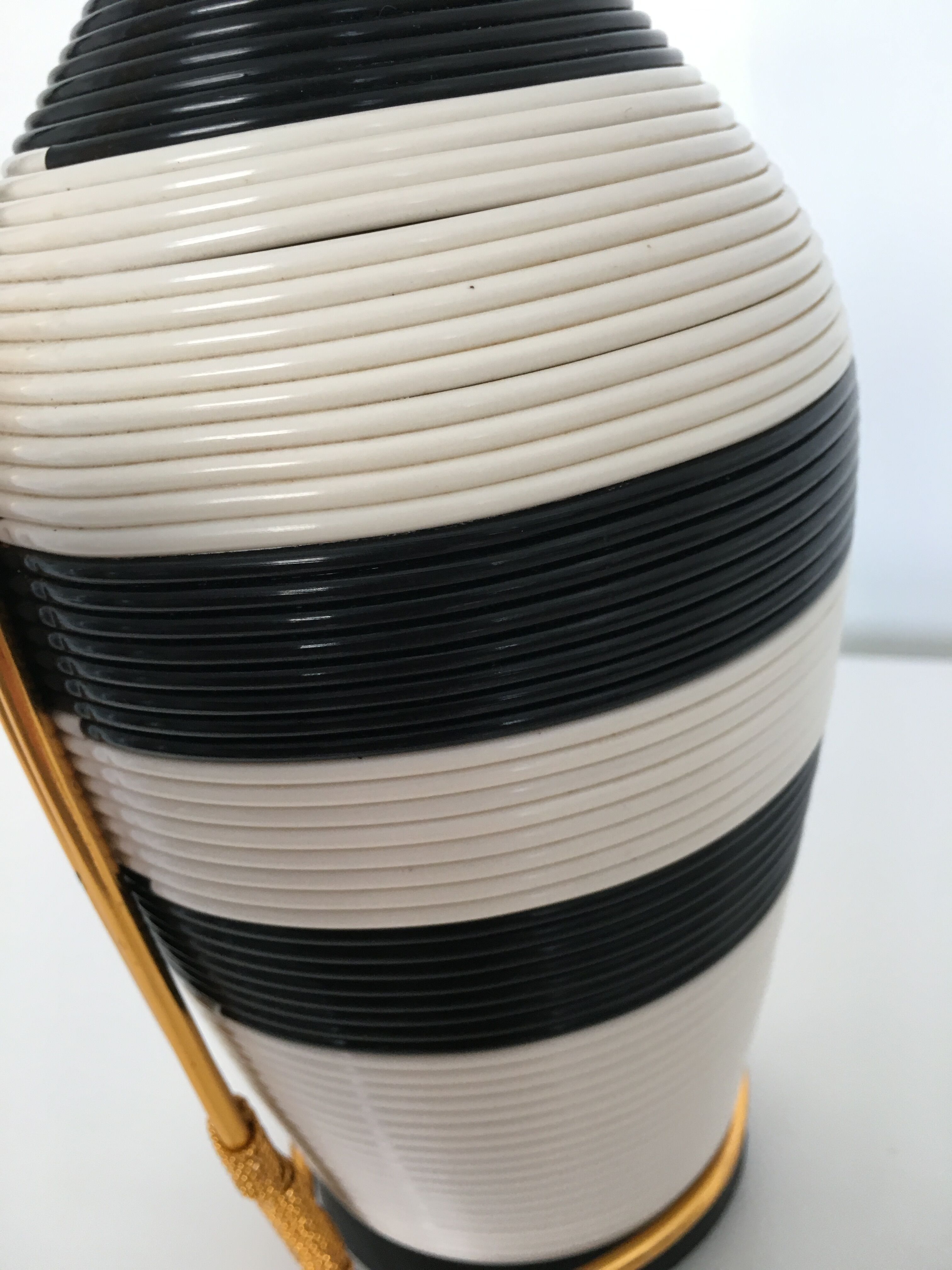 White and black scoubidou bottle