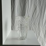 Glass vase with stylized flower pattern