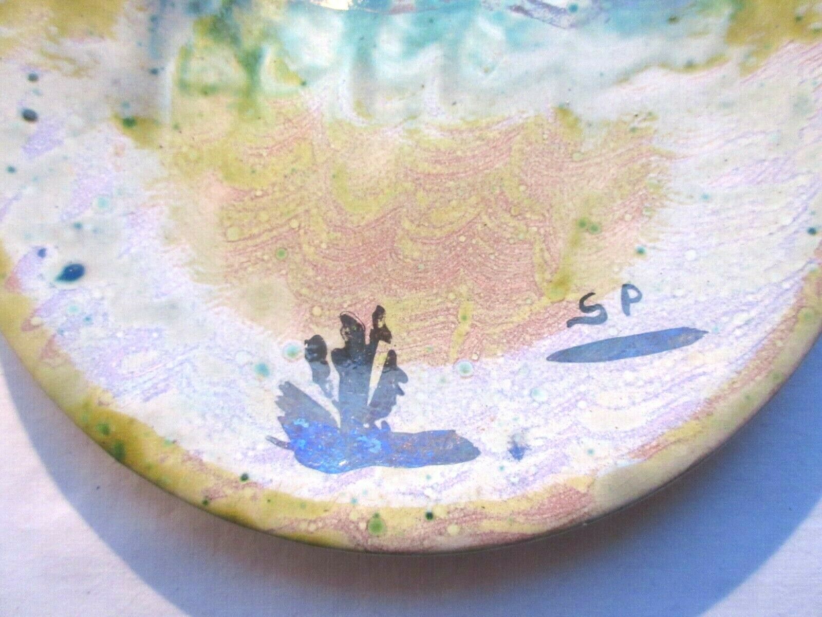 Dabbling plate with trompe l'oeil fish, signed sp,