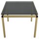 Table basse italienne des années 1970 avec finition en laiton et plateau en verre fumé