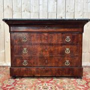 Renaissance period chest of drawers in flamed mahogany veneer