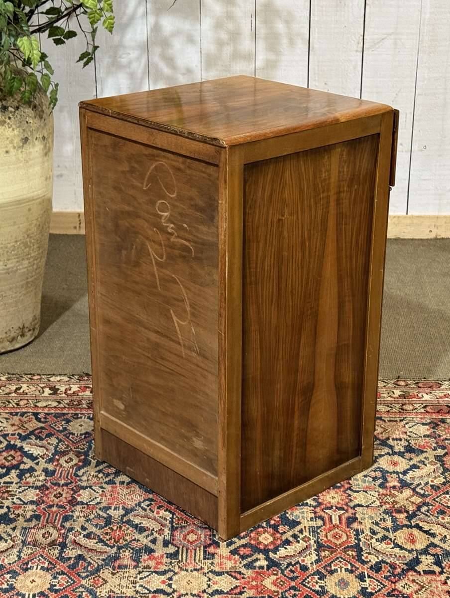 English Art Deco bedside table from the 1950s in walnut.