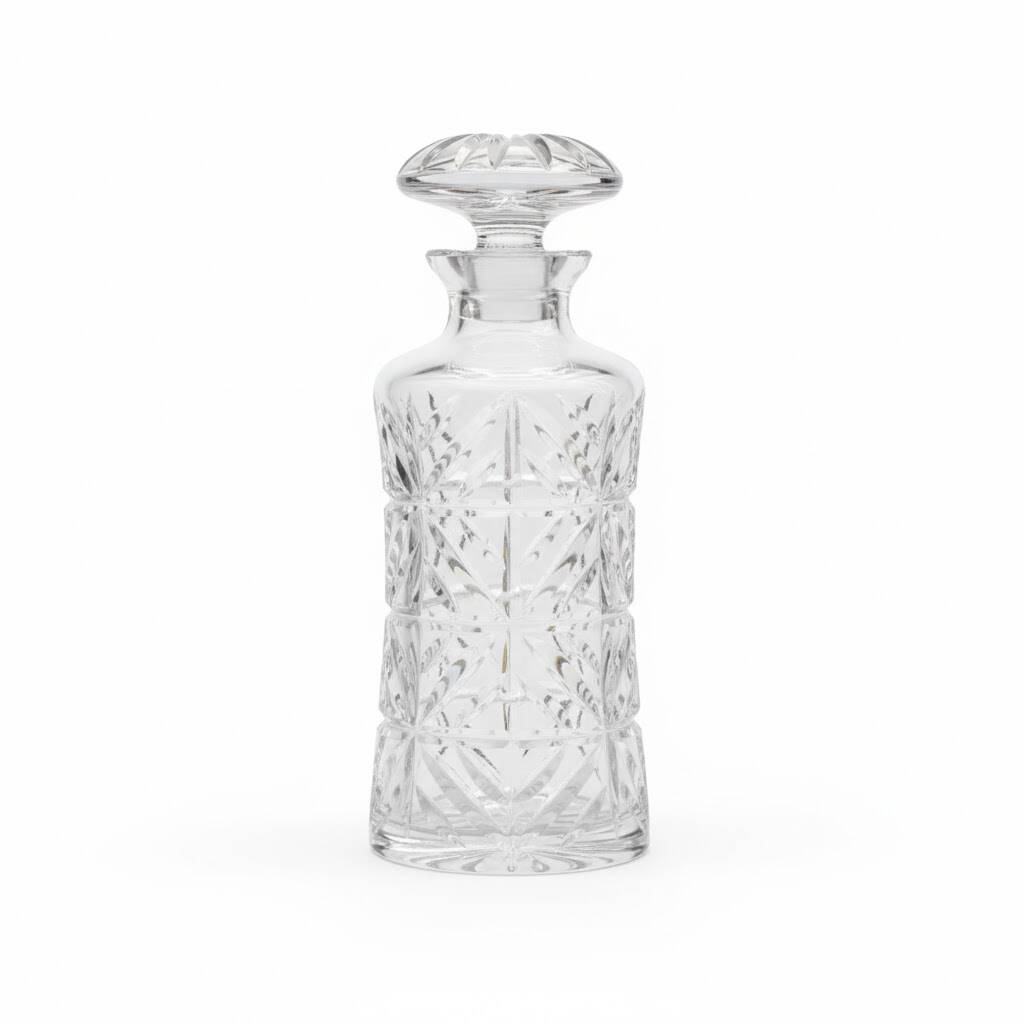 Grande carafe en verre taillé avec large bouchon circulaire plat