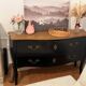 Curved chest of drawers in black wood and oak – Louis XV style revisited