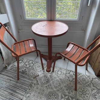 Tolix pedestal table and two chairs