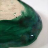 Vintage green slipware bowl in the shape of a cabbage leaf.
