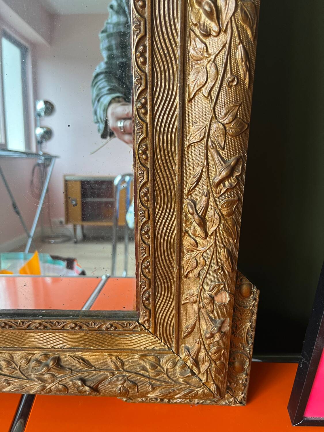 Golden trumeau mirror for fireplace, late 19th century, with sculpted pediment.