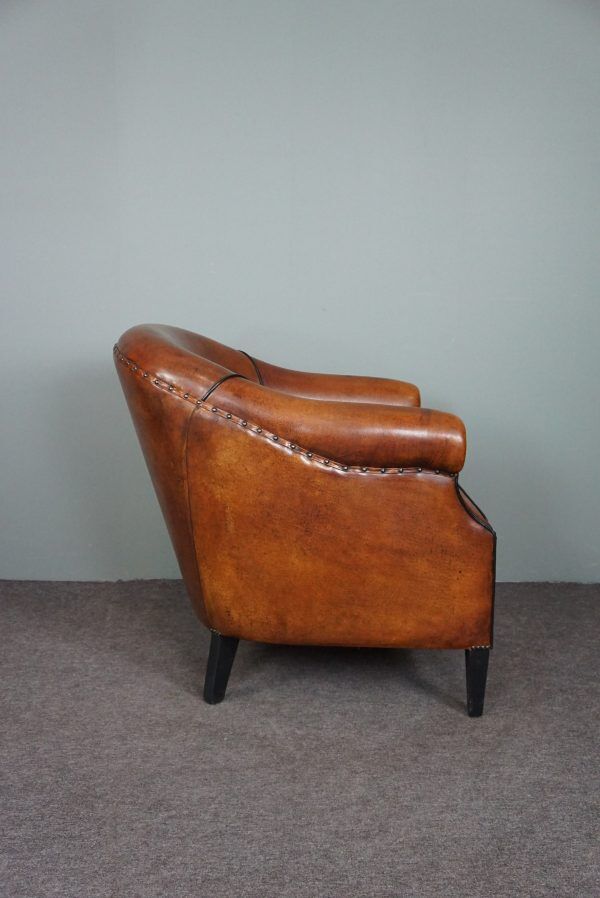 Leather club chair with black piping