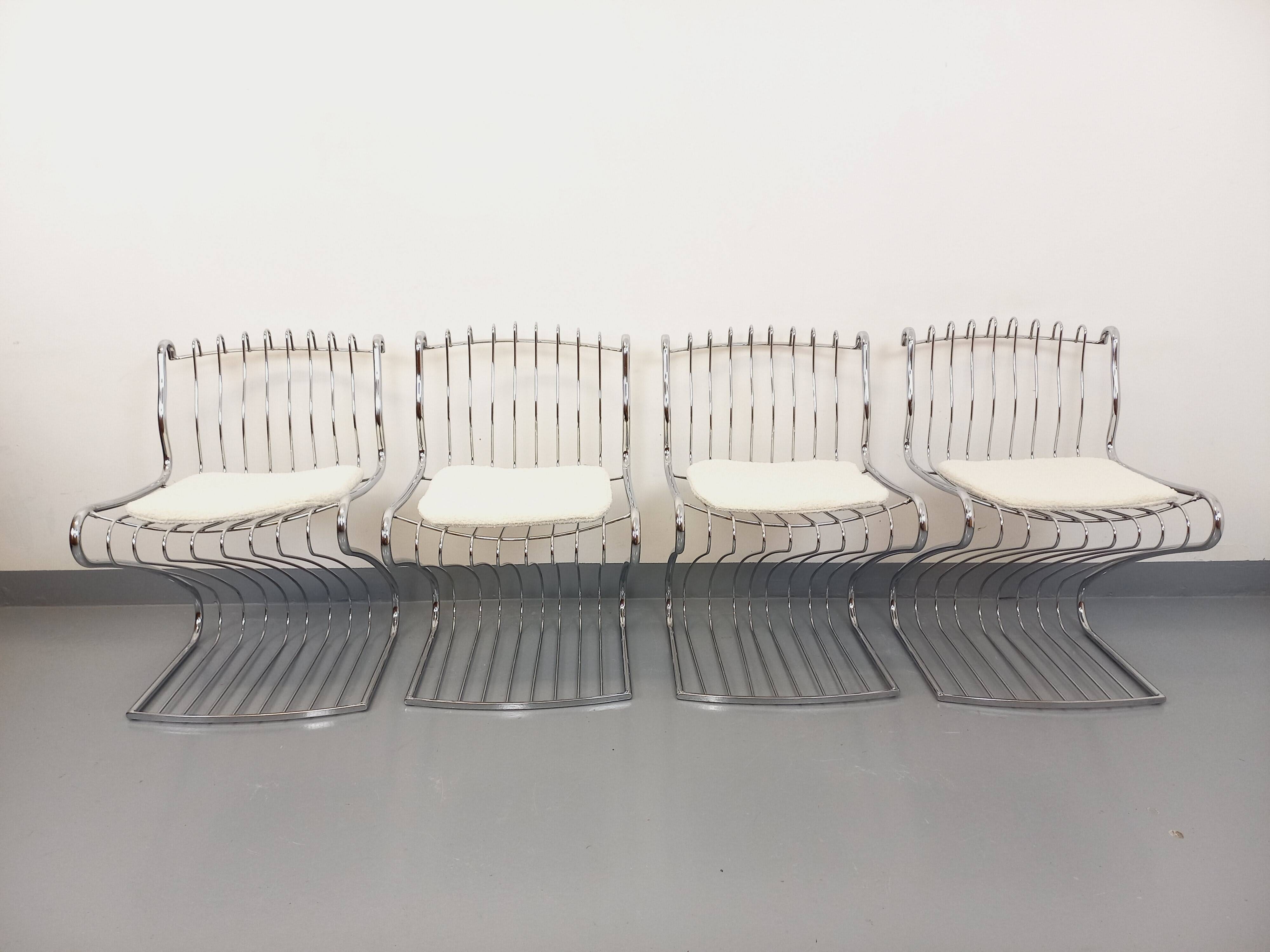 Set of 4 vintage Italian chairs by Gastone Rinaldi in chrome metal.