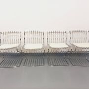 Set of 4 vintage Italian chairs by Gastone Rinaldi in chrome metal.