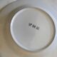 Set of four retro dessert plates in shades of red