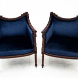 Blue bergere armchairs